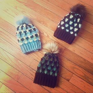 Beautiful handmade hats with faux fur pom pom